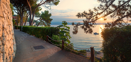 Fototapeta Naklejka Na Ścianę i Meble -  idyllic seaside promenade, morning mood at Moscenicka Draga, croatia