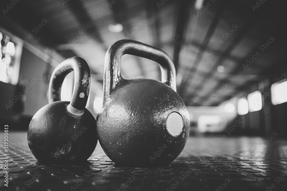 Close up image of kettle bell weights in a gym - obrazy, fototapety, plakaty 