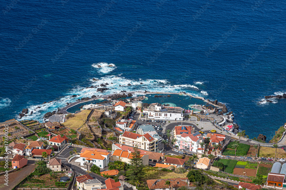 View on the village of Porto Moniz on the Portugese island of Madeira in summer