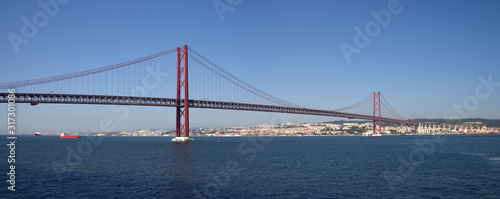 Lisbon 25th of April bridge panorama seen from water level