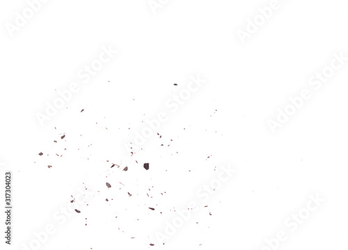 crumbs of dark chocolate isolated on white background