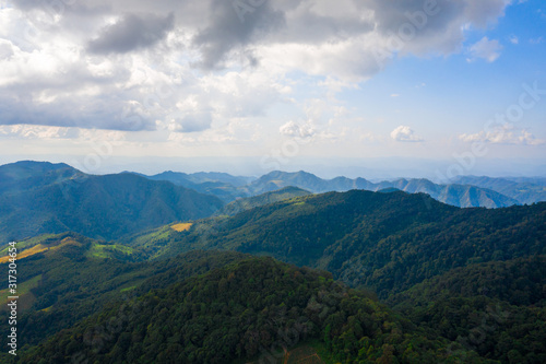 Aerial landscape of mountain and blue sky with cloud at Doi Mae U Kho, Khun Yuam, Mae Hong Son, Thailand