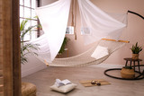 Comfortable hammock in stylish room. Interior design