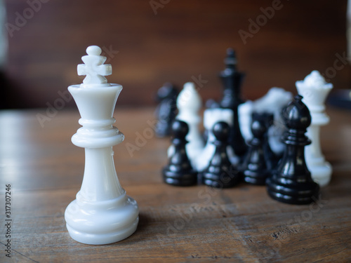  Isolate white king. Chess business idea for competition in world market, success and leadership concept.