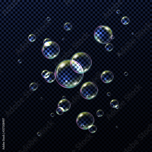 Realistic soap bubbles isolated on transparent background. Vector illustration.