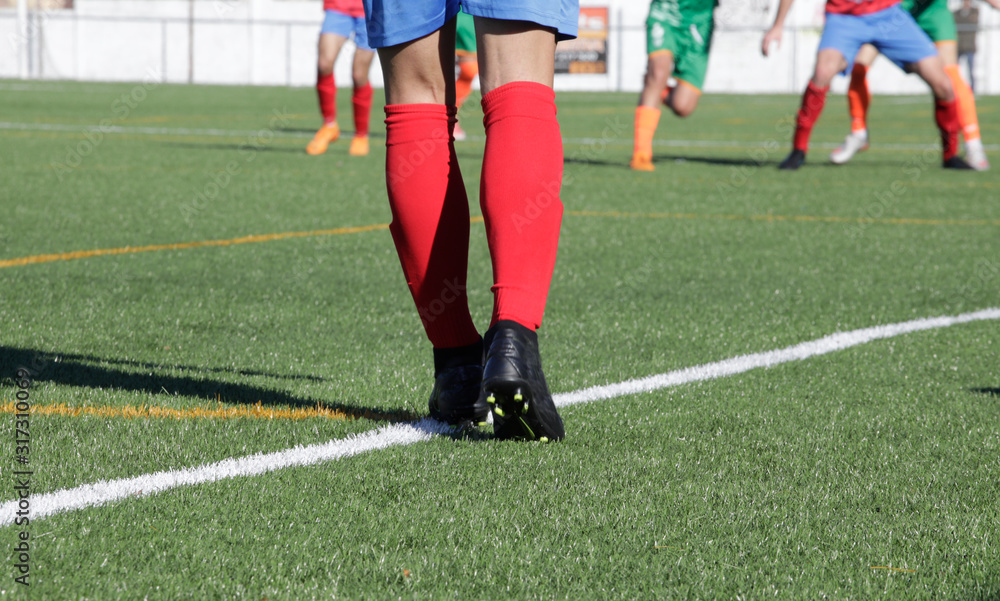 Football match in an artificial grass soccer field Football match in an artificial grass soccer field