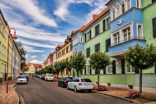schönebeck, deutschland - straße mit sanierten häusern photo