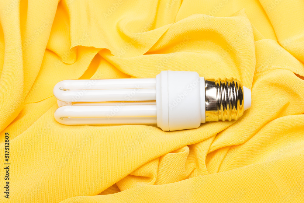 Energy saving light bulb and white light; home and work lighting. Energy saving light bulb and white light; home and work lighting.