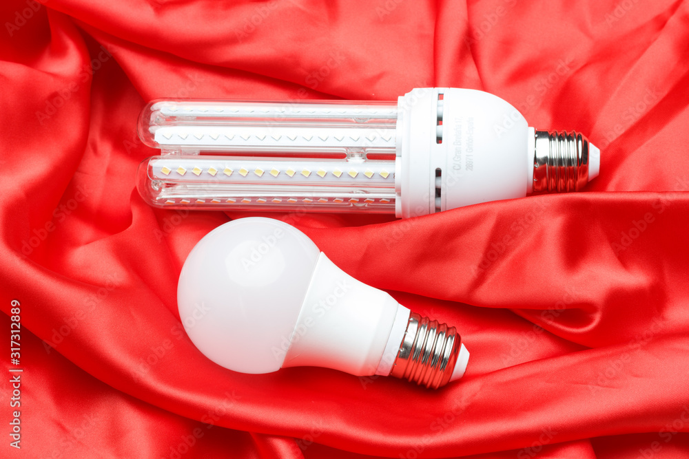 Energy saving light bulb and white light; home and work lighting. Energy saving light bulb and white light; home and work lighting.