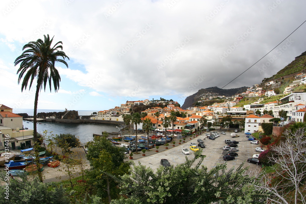 view of the city of camara de lobos at madeira island