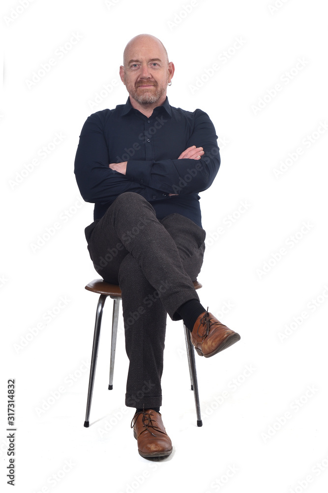 bald man sitting on white background - obrazy, fototapety, plakaty 
