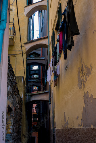 Cinque Terre, Italy, December 5, 2019. Clothes to dry hanging in the windows. © Nora