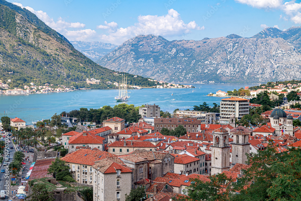 Panoramic view of Kotor Bay and Kotor old historic town in a sunny summer day. Montenegro.