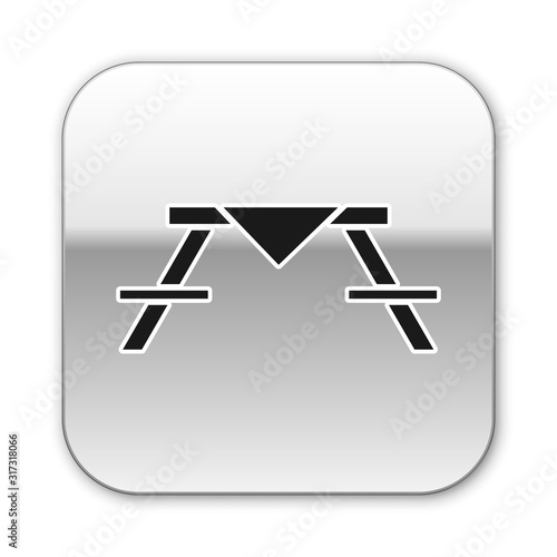 Black Picnic table with benches on either side of the table icon isolated on white background. Silver square button. Vector Illustration