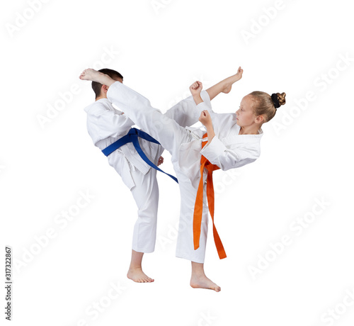 Mae geri and ura-mavashi geri are beating sportsmens in karategi