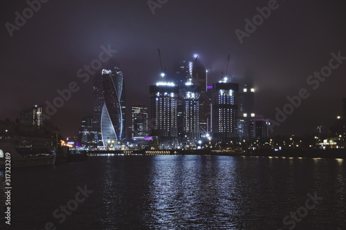 Moscow City building at night view from the Moscow river. Moscow, Russia. © volhavasilevich