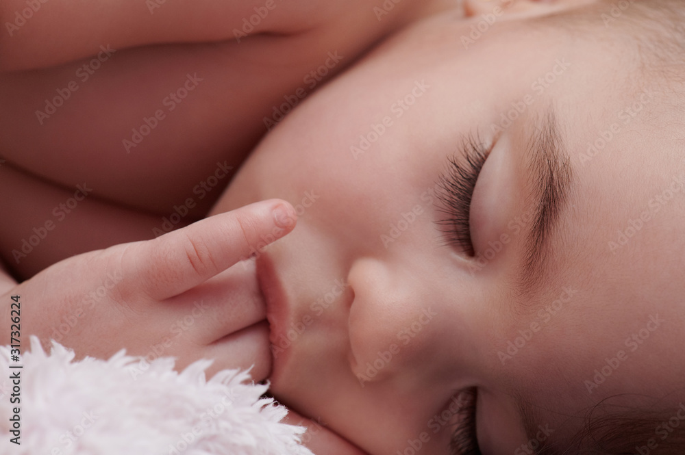 Baby girl sucking finger Baby girl sucking finger