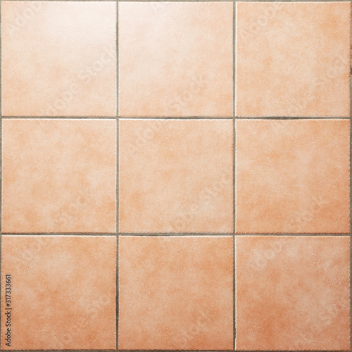 Beige-brown square shaped rustic style design ceramic floor flat tiles texture pattern background. Nine tiles 3X3