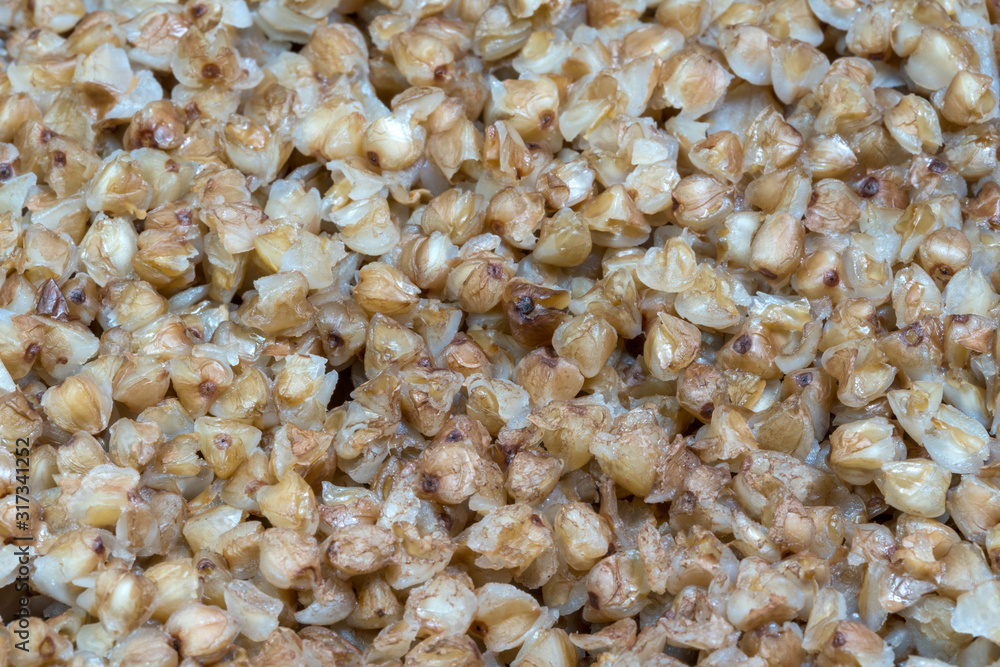 boiled buckwheat of brown color background boiled buckwheat of brown color background