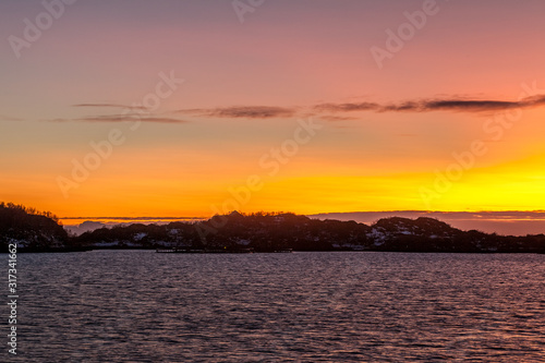 Amazing Sunset over Lofoten island  Norway. Dramatic winter landscape