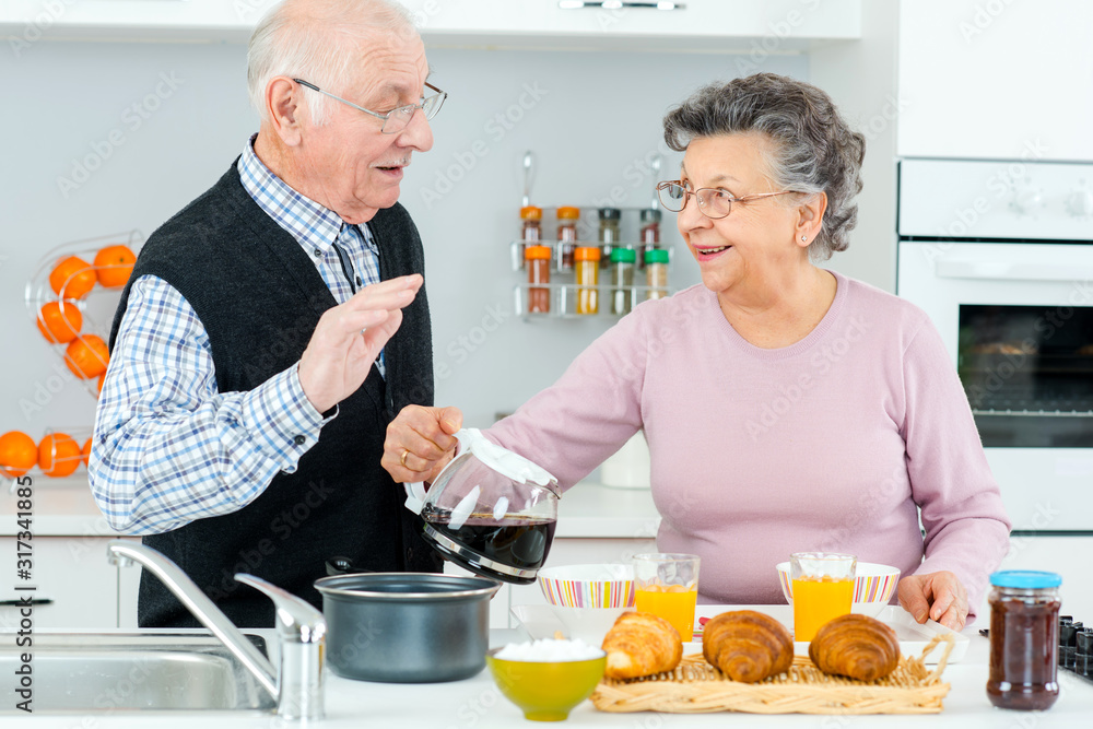 senior couple taking a healthy breakfast senior couple taking a healthy breakfast