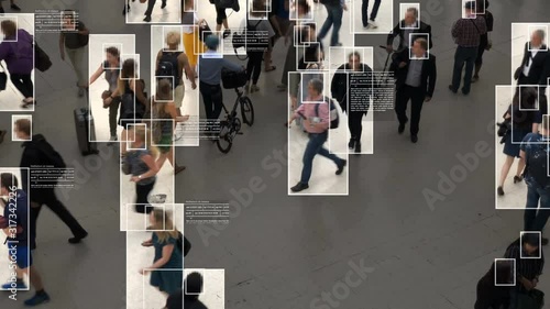 High view of commuters walking. Facial recognition interface showing personal data for each person. Surveillance concept. Artificial intelligence. Deep learning. photo