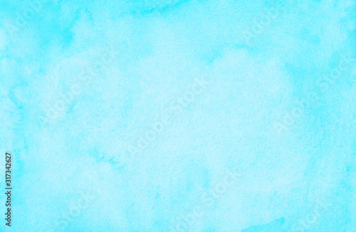 Watercolor pastel cyan blue background painting. Watercolour bright sky blue stains on paper. Artistic frame backdrop.