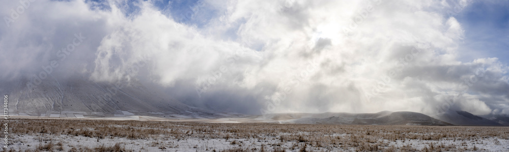 Fading clouds after the blizzard in Pian Grande, Castelluccio, Norcia, Umbria, Italia Fading clouds after the blizzard in Pian Grande, Castelluccio, Norcia, Umbria, Italia