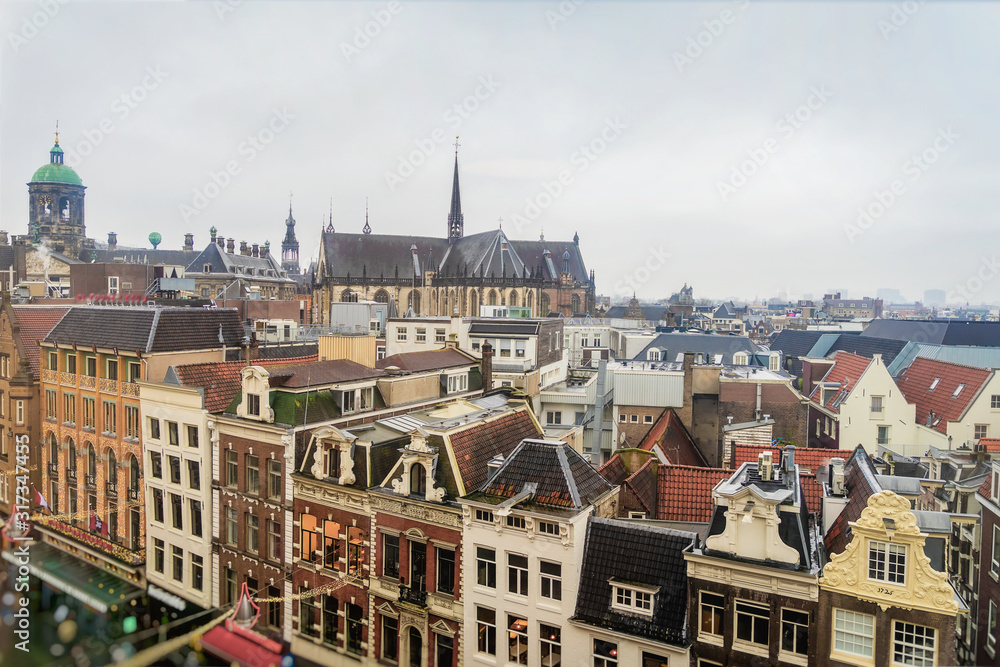 Roofs of old Dutch medieval houses in Amsterdam, top view