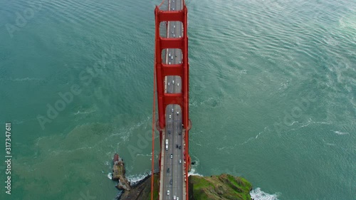 Aerial view of the Golden Gate Bridge. San Francisco, US. With the hilly Marin Headlands in the background. This suspension bridge is one of the most iconic landmarks of California. Shot on Red weapon photo