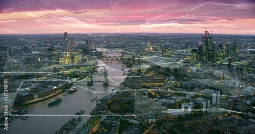 Aerial view of London Skyline with connections. Technology-Futuristic. High tech view of the financial district connected through a network. Internet of Things. Artificial intelligence. photo