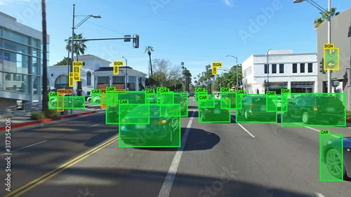 Autonomous car driving through Los Angeles. Computer vision. Object detection system that creates boxes to recognize objects in the streets. Artificial intelligence technology. 