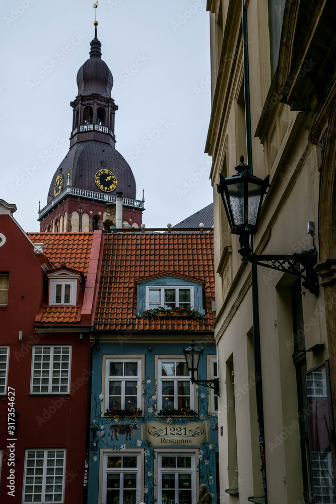 Obraz premium Cozy small street in Old Riga, Latvia