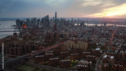 Wallpaper Mural Famous skyscrapers and the Manhattan Bridge during sunset. The Financial District in the background. Lower Manhattan skyline, United States, North America. Shot from a helicopter. Torontodigital.ca