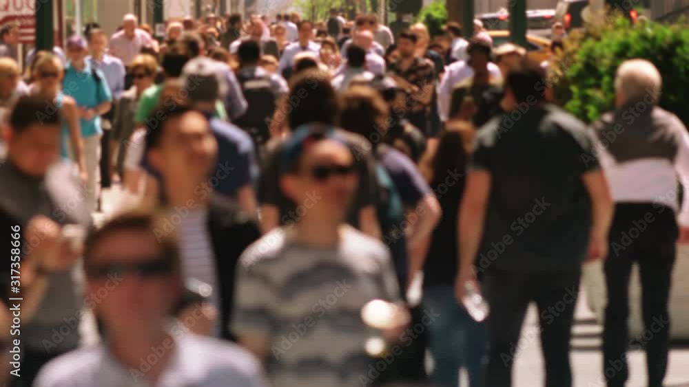 Anonymous crowd walking in New York City. People walking on busy street of Manhattan. More options in my portfolio. Anonymous crowd walking in New York City. People walking on busy street of Manhattan. More options in my portfolio.