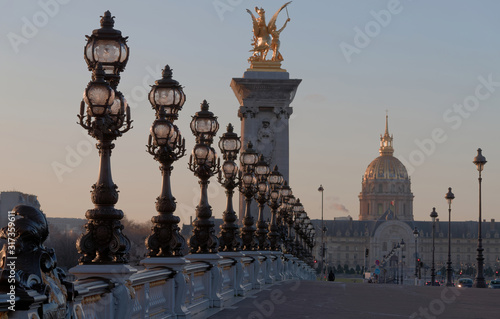Ornate lamp posts along the Alexandre bridge III br in Paris