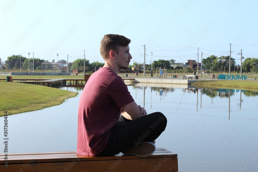 man sitting on a bench man sitting on a bench