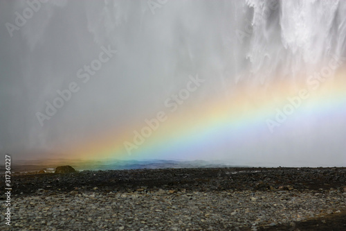 Rainbow in the waterfall in Iceland
