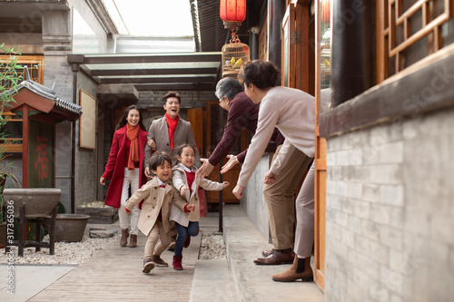 Wallpaper Mural Happy family celebrating Chinese New Year Torontodigital.ca