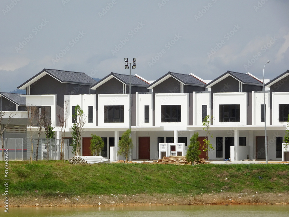 New double story luxury terrace house under construction in Malaysia. Designed by an architect with a modern and contemporary style. New double story luxury terrace house under construction in Malaysia. Designed by an architect with a modern and contemporary style.