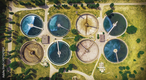 Modern wastewater and sewage treatment plant with aeration tanks, aerial top view.
