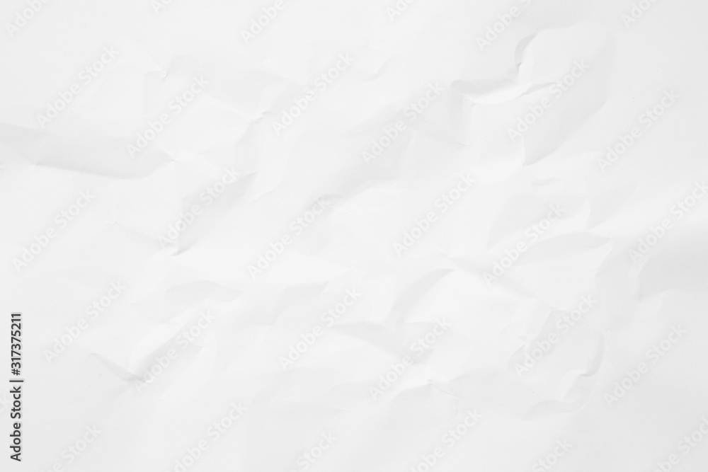 Fototapeta premium Clean white paper, wrinkled, abstract background.