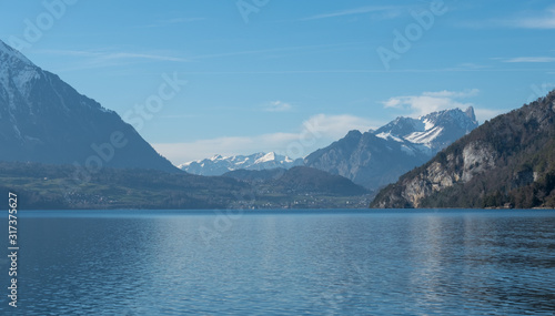 Lake Thun near the town of Spietz, Interlaken, Switzerland, photographed on a clear day whilst on a boat tour of the lake in mid winter. © Lois GoBe