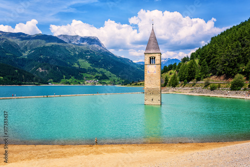 Church in the lake Reschensee bell tower, South Tyrol, Italy