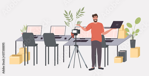 man blogger recording unboxing video with digital camera on tripod live streaming social network blogging concept horizontal full length vector illustration