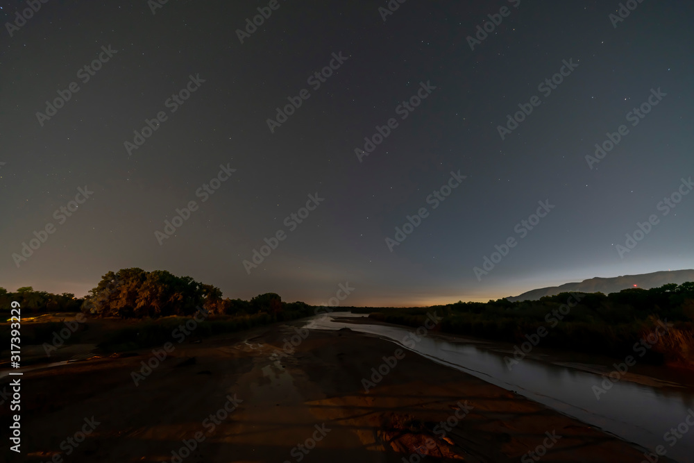Fototapeta premium Night view of the Rio Grande river with a starry sky