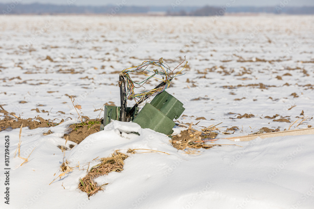 Telephone pedestal junction box broken and damaged with exposed wires