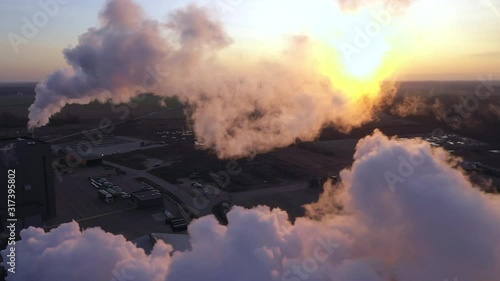 Drone shot of the thick white smoke in the air in Imavere Estonia photo