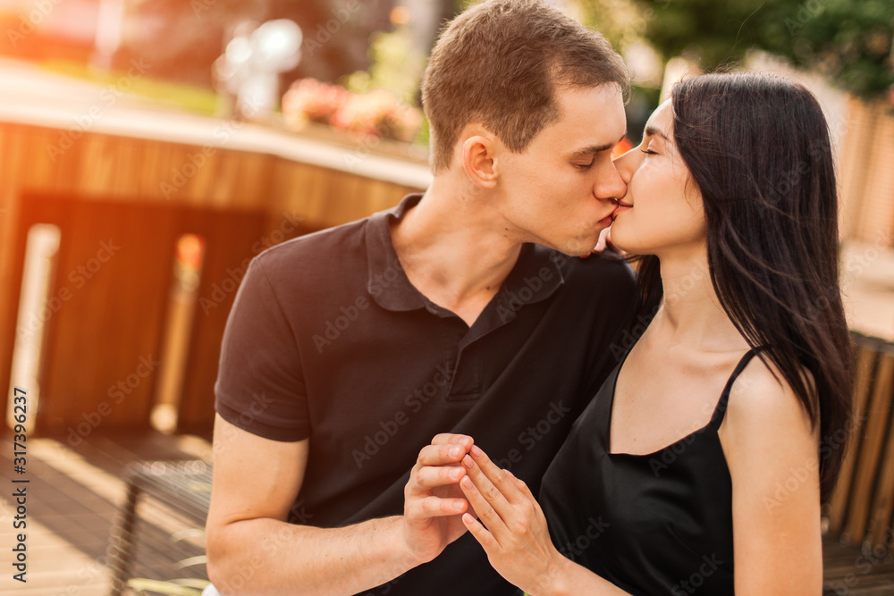 Loving couple hugging in the street. Loving couple hugging in the street.