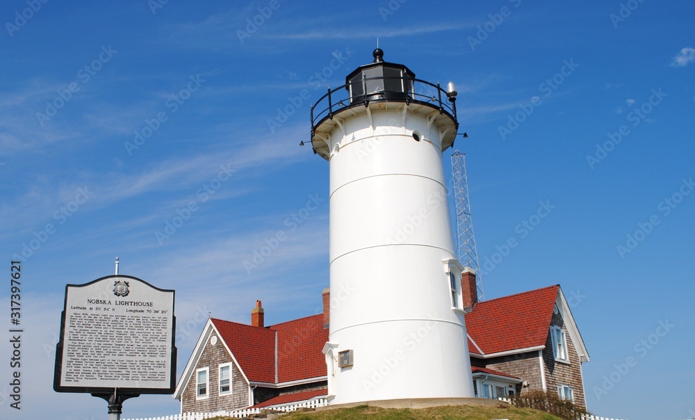 Nobska Lighthouse in Falmouth, MA on a sunny day in early spring.